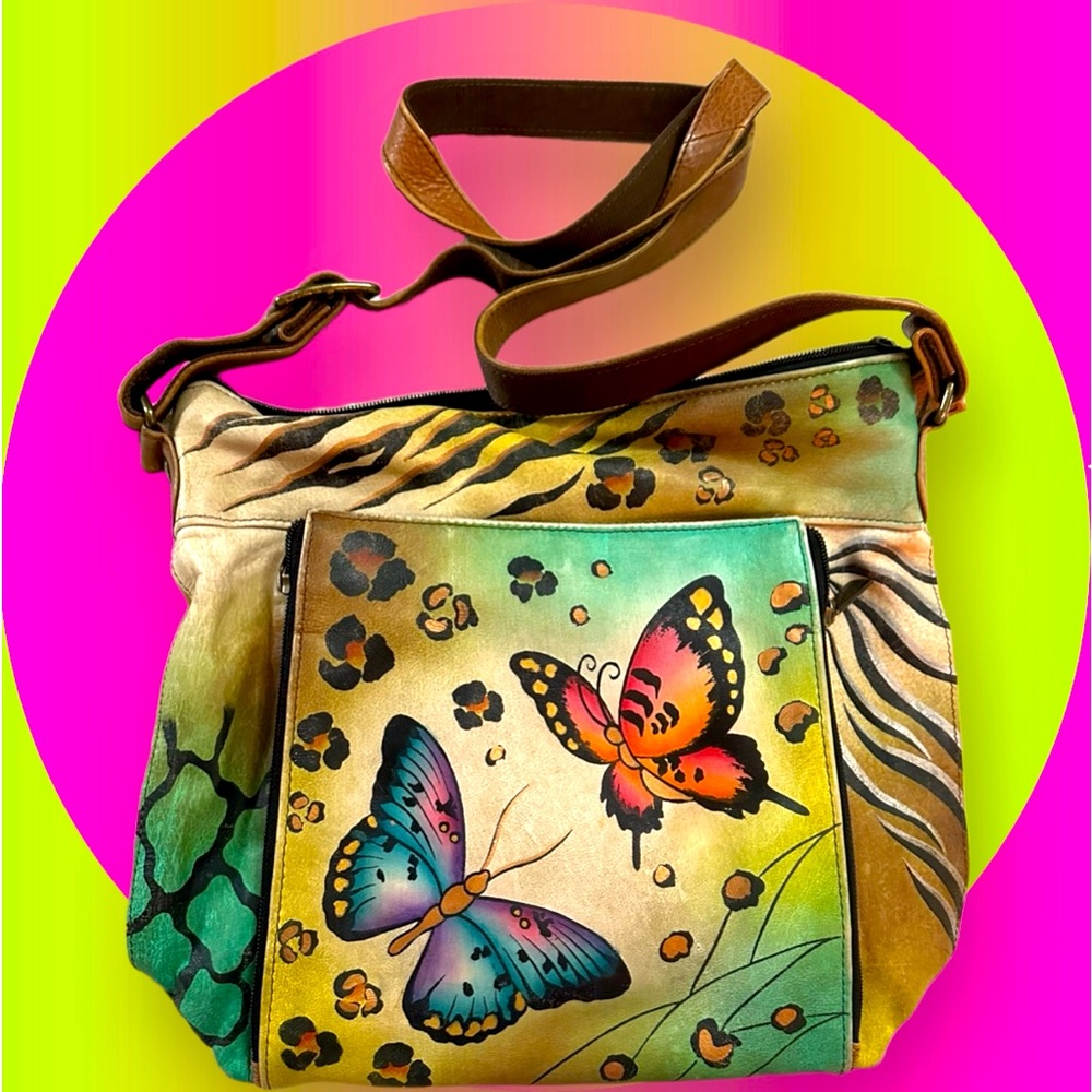 Anuschka original leather handbag, and Crossbody. 10 by 11